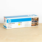 OEM HP CB542A Yellow Toner Cartridge (1,400 Pages)